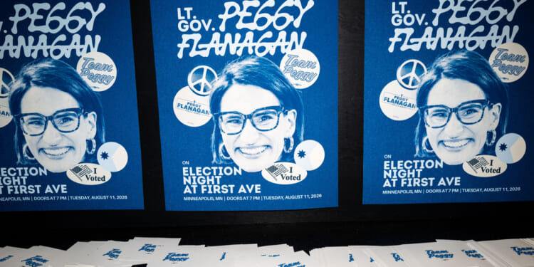 Signage is displayed during a primary election night party for Democratic candidate for U.S. Senate, Minnesota Lt. Gov. Peggy Flanagan.