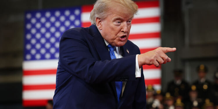 President Donald Trump arrives to deliver remarks at the David S. Mack Center for Training and Intelligence on August 14, 2026 in Garden City, New York. President Trump visited the police academy to highlight the FBI's 2025 Crime Statistics Report and rally support for local Republican candidates ahead of the upcoming midterm elections. (Photo by Samuel Corum/Getty Images)