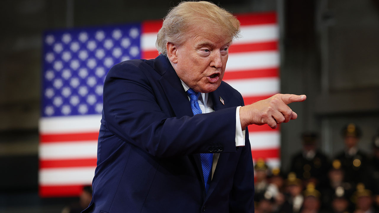 President Donald Trump arrives to deliver remarks at the David S. Mack Center for Training and Intelligence on August 14, 2026 in Garden City, New York. President Trump visited the police academy to highlight the FBI's 2025 Crime Statistics Report and rally support for local Republican candidates ahead of the upcoming midterm elections. (Photo by Samuel Corum/Getty Images)