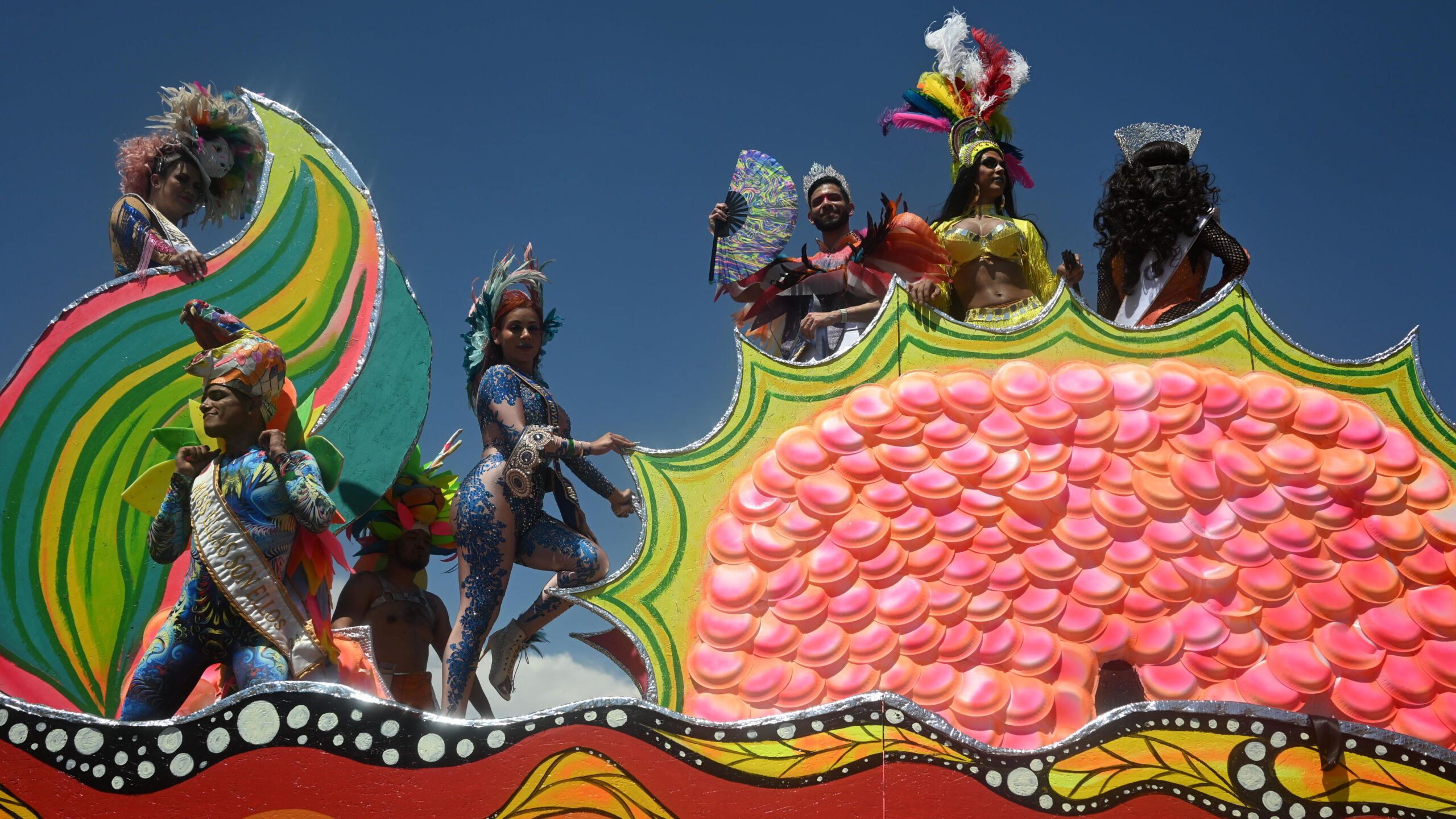 A float with costumed participants passes by during the 2025 Denver Pride Parade on June 29, 2025 in Denver, Colorado. Organizers estimate that over 100,000 will attend the LGBTQ+ pride festivities. (Photo by Mark Makela/Getty Images)