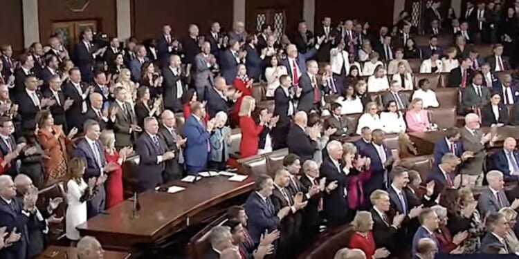 Republicans stand and applaud while Democrats remain seated during numerous moments in President Donald Trump's State of the Union address on Tuesday, Feb. 24, 2026 (Video screenshot)