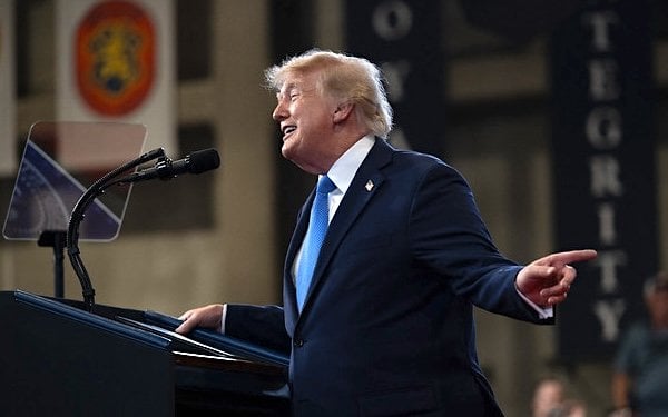 President Donald J. Trump delivers remarks at the David S. Mack Center for Training and Intelligence in Garden City, New York, Friday, Aug. 14, 2026. (Official White House photo by Molly Riley)