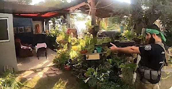 Hamas terrorists use GoPro video to document themselves entering homes and shooting Israelis inside in October 2023. (Video screenshot)