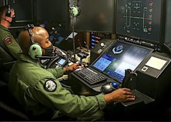 U.S. Marine Corps Captain Joshua Brooks, an unmanned aircraft system representative, and Master Sergeant Willie Cheeseboro Jr., an enlisted aircrew coordinator with Marine Unmanned Aerial Vehicle Squadron 1, prepare to launch and operate the first Marine Corps owned MQ-9A Reaper on Marine Corps Air Station Yuma, Arizona, Aug. 30, 2021. (U.S. Marine Corps photo by Lance Cpl. Gabrielle Sanders)
