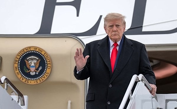 President Donald J. Trump disembarks Air Force One at Joint Base Elmendorf-Richardson in Anchorage, Alaska, Tuesday, Oct. 13, 2026. (Official White House photo by Molly Riley)