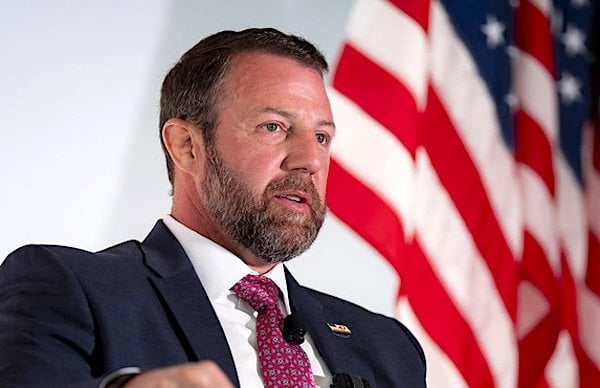 U.S. Secretary of Homeland Security Markwayne Mullin participates in a fireside chat with Matt Boyle of Breitbart News at the Willard InterContinental Washington in Washington, D.C., on Tuesday, Oct. 6, 2026. (DHS photo by Tia Dufour)